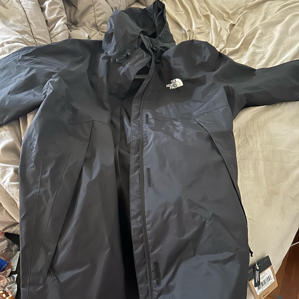 Woman’s North Face Raincoat Coat